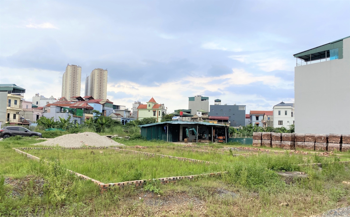 Đất nền Đan Phượng phía Tây Hà Nội với khu dân cư và cao tầng phía sau